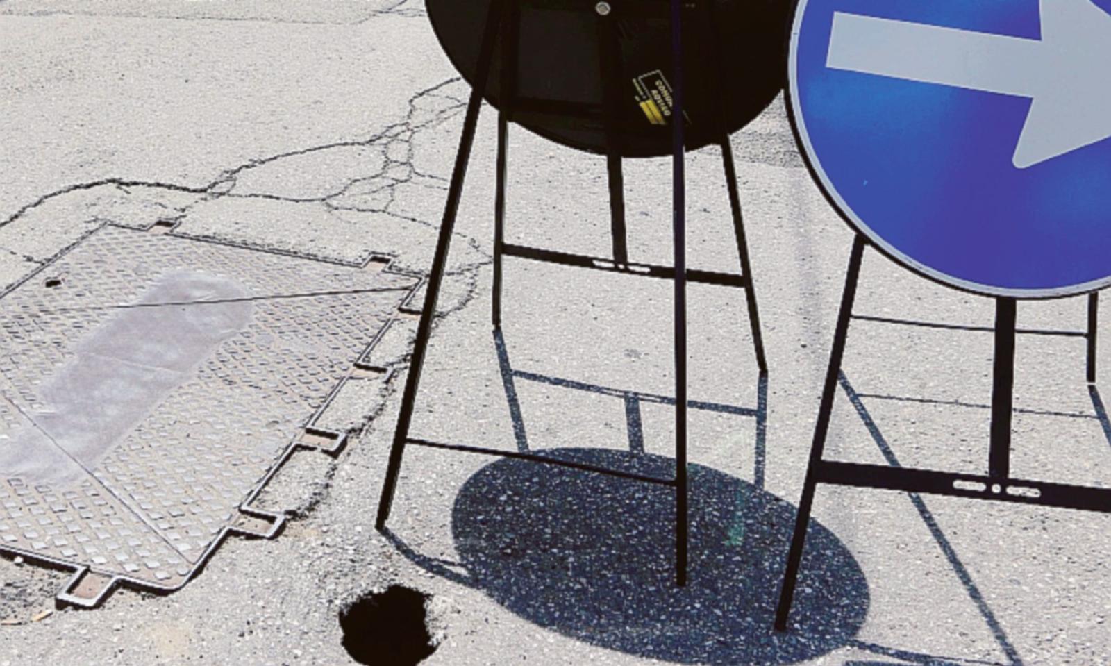 Cratere nel bel mezzo della strada