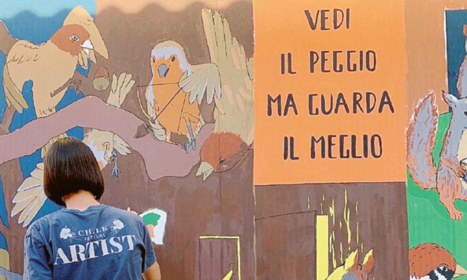 Gli scout e il murale alla sede di via Alfieri