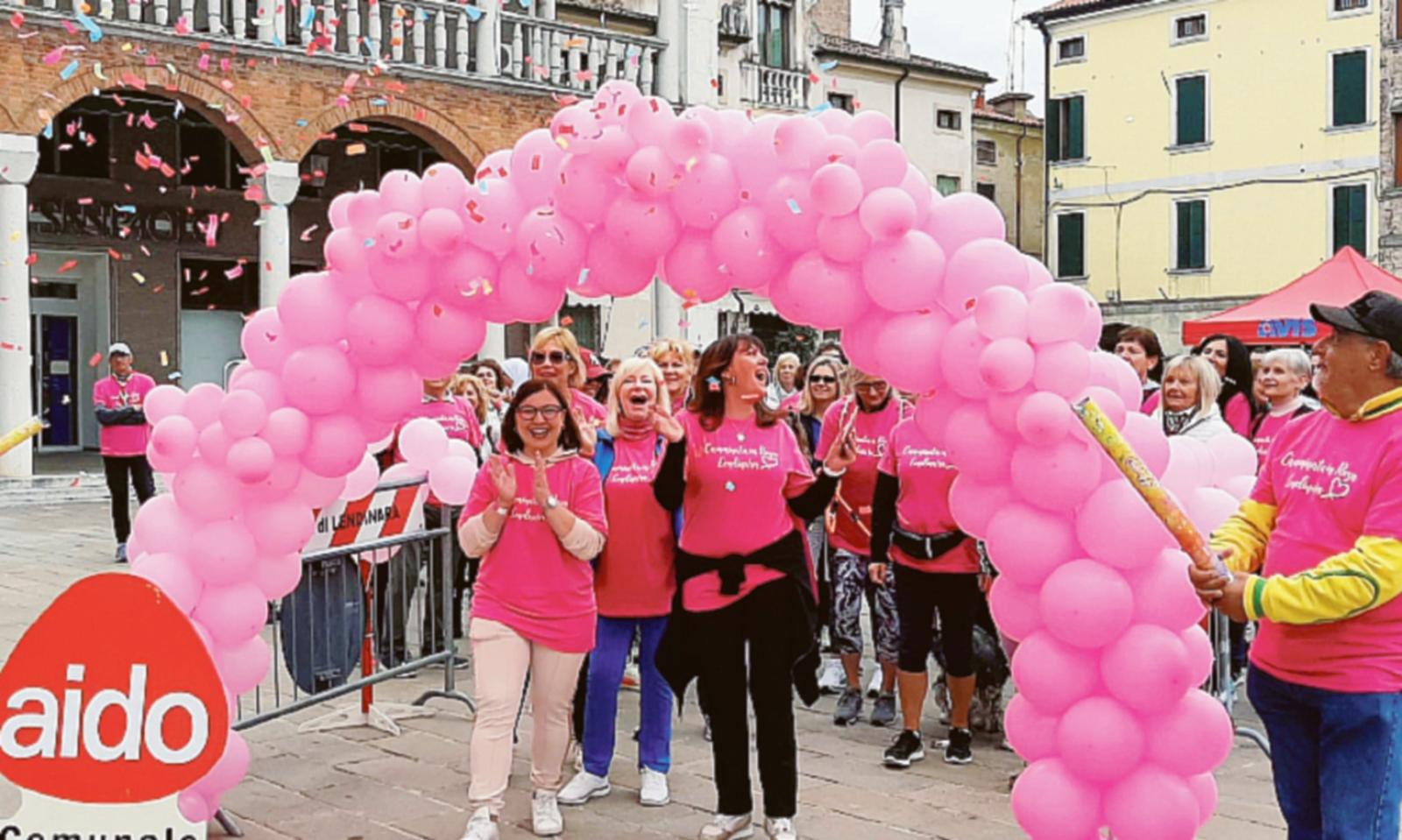 Maglie rosa di corsa in centro