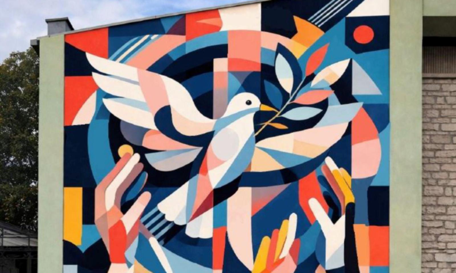 Un murales per la pace sulla parete della palestra