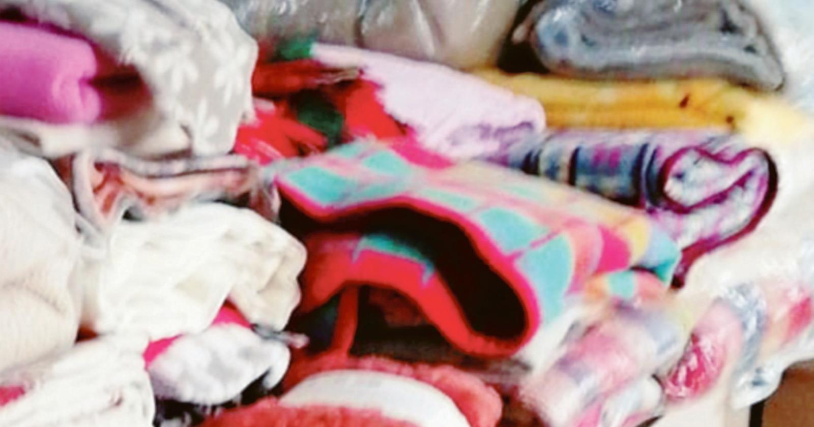 Coperte e abiti per chi non ha