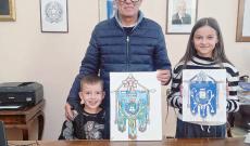 Alex e Alessia firmano il logo