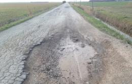 Le strade della città sono piene di buche