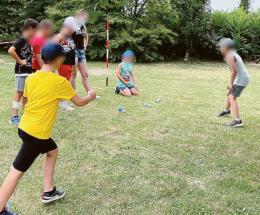 Bambini a scuola di bocce