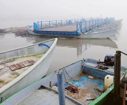 La piena del Po porta detriti e disagi